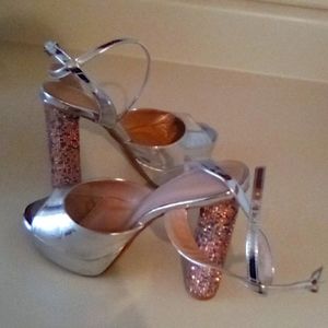 Silver and rimestones high heels